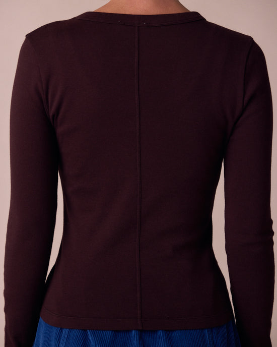 model wears lila beetroot jersey top