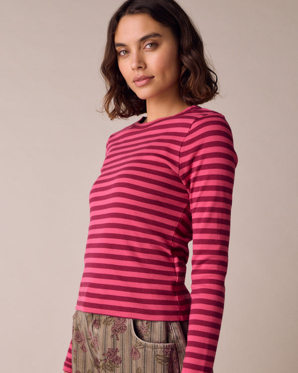 model wears lila raspberry and damson jersey top
