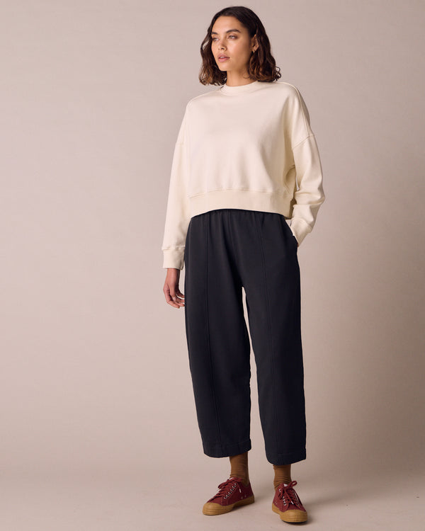 model wears mabel washed black fleeceback jersey trousers right