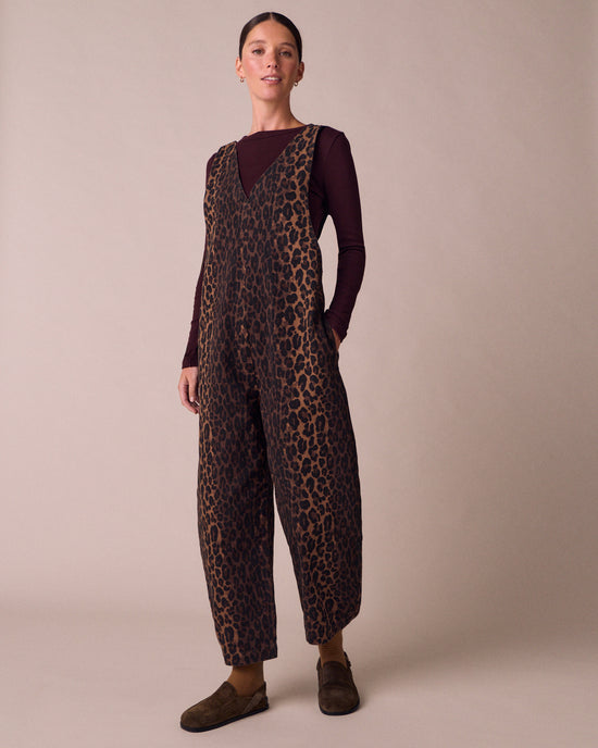model wears ottie dark leopard denim jumpsuit