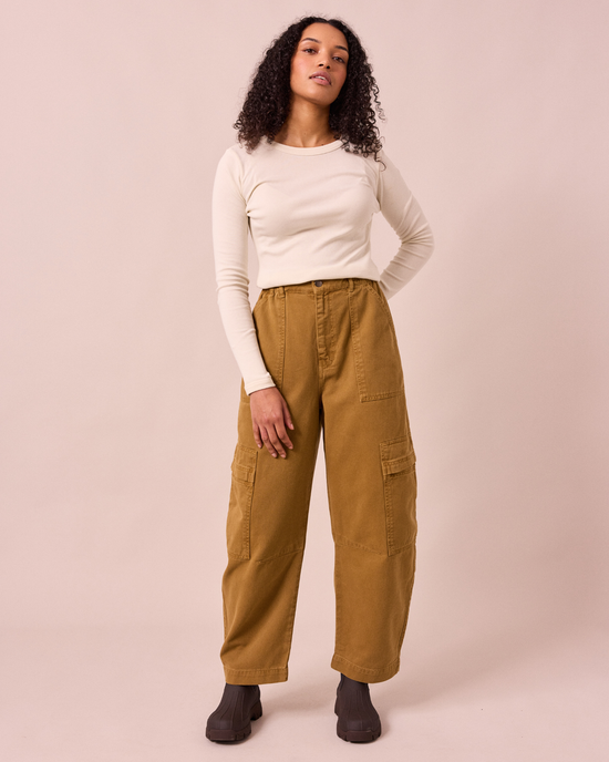 model wears reba nutmeg denim jeans right