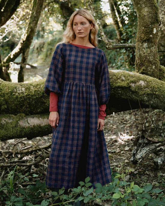 model wears berlin cedar check linen dress