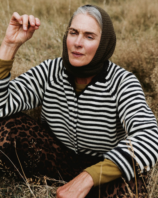 model wears henna charcoal stripe knitted cardigan