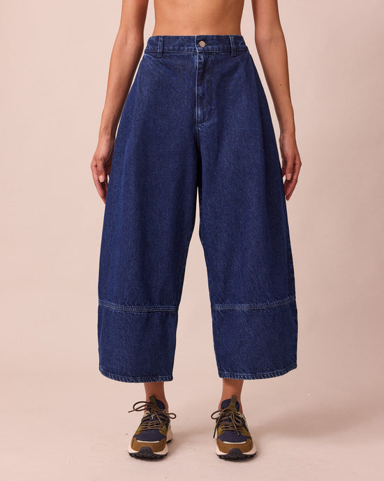 model wears blair dark wash denim jeans front