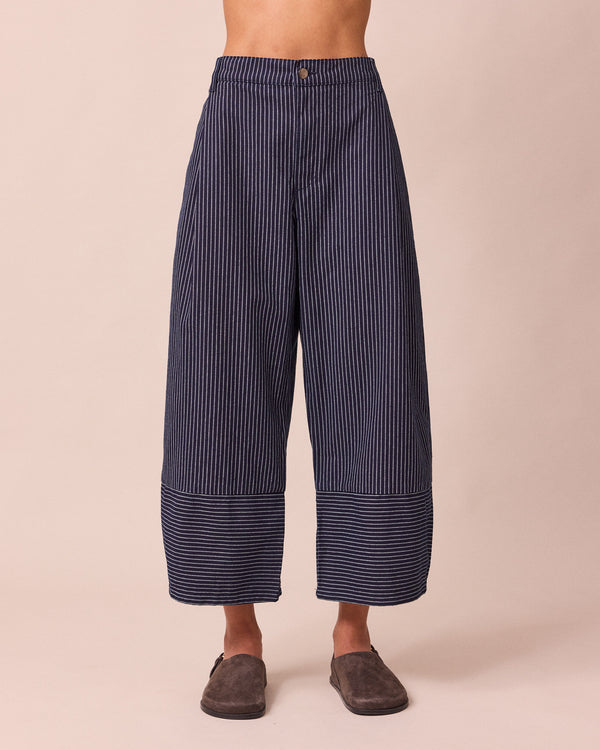 model wears blair navy pinstripe denim jeans front