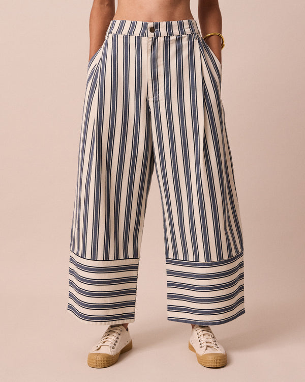 model wears blair sailor stripe denim jeans front