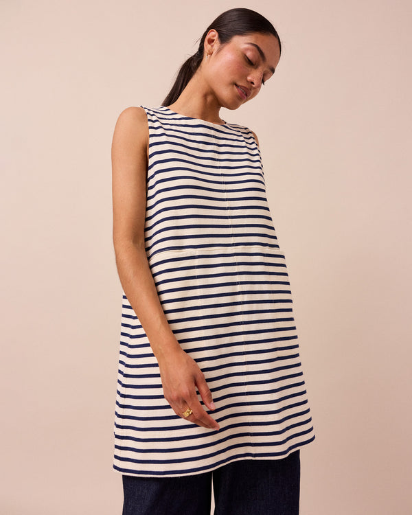 model wears a bree navy and ecru stripe tunic