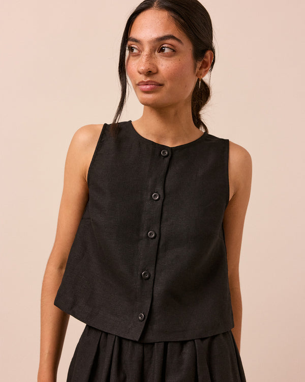 model wears black elodie linen top
