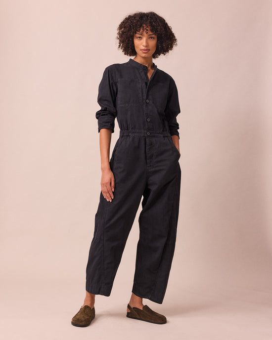 model wears jill black textured cotton jumpsuit