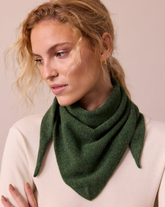 model wears knitted apple green neckerchief
