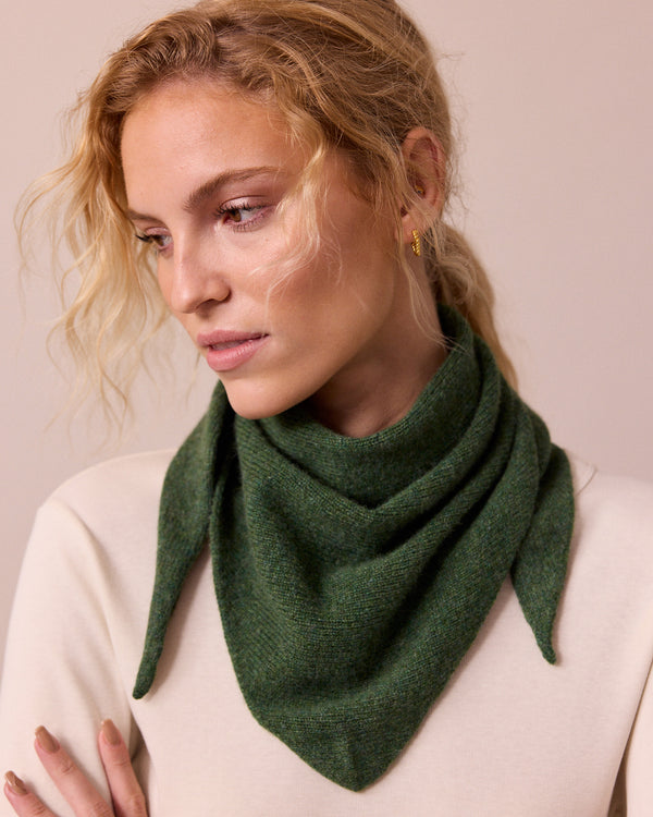 model wears knitted apple green neckerchief