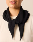 model wears black knitted neckerchief
