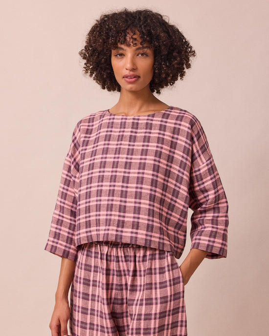 model wears lily dewberry check linen top