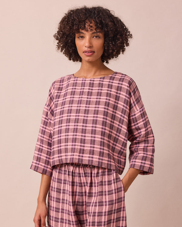 model wears lily dewberry check linen top