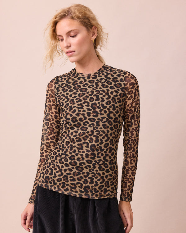 model wears mesh leopard print long sleeved top