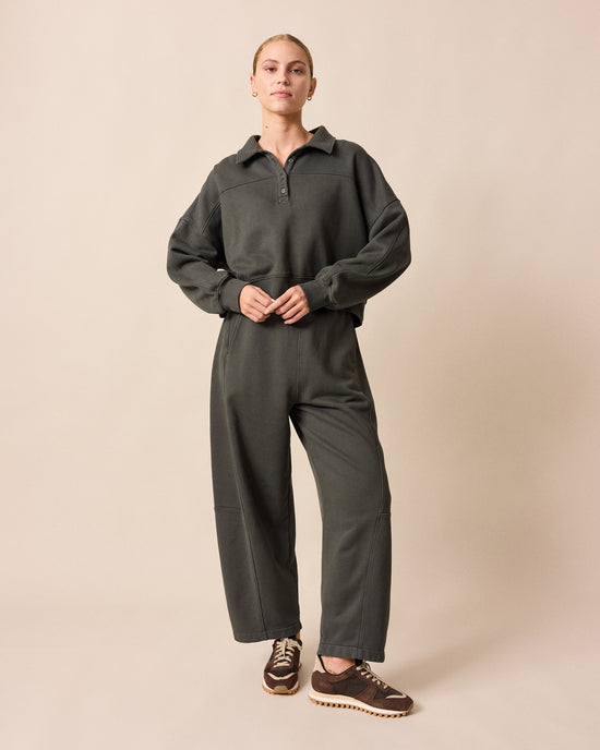 model wears lyra pumice fleeceback jersey trousers left