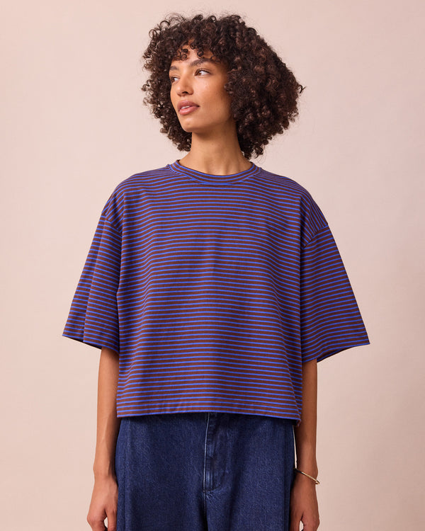 model wears nova brown and blue stripe jersey top