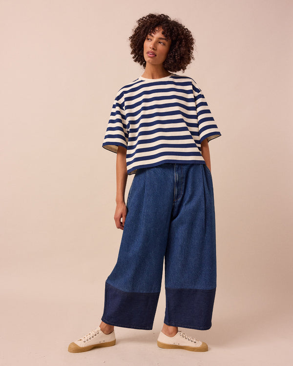 model wears the nova ecru and french navy top