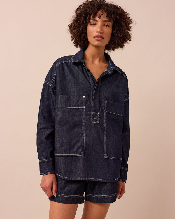 model wears olla indigo wash denim shirt