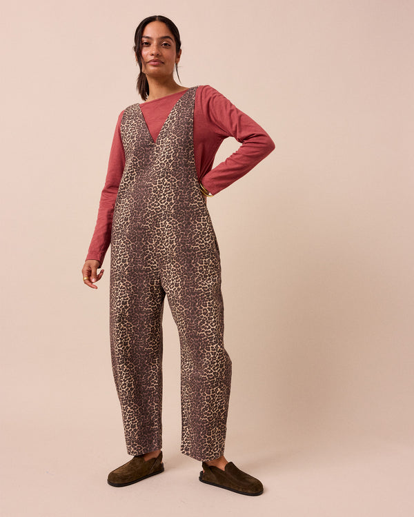 model wears leopard print ottie jumpsuit