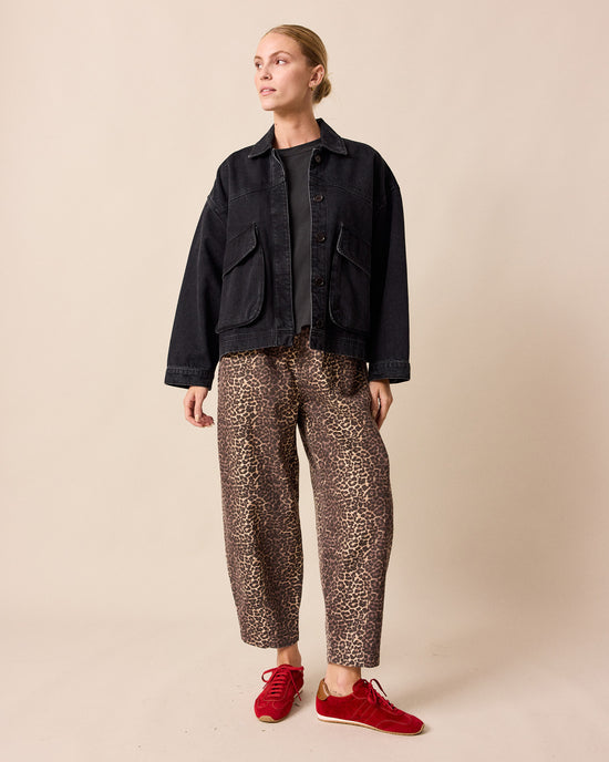 model wears remi leopard print denim jeans right