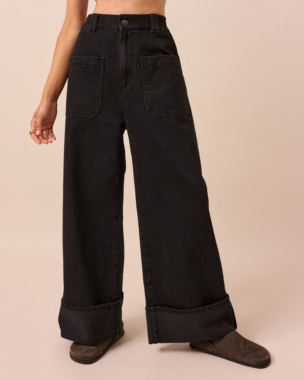 model wears teddi washed black denim jeans front