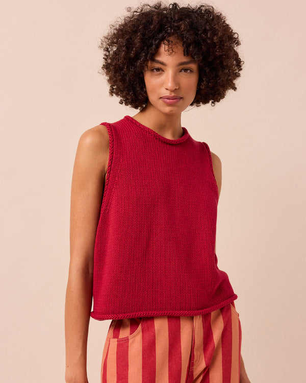 model wears tyler cranberry knitted vest