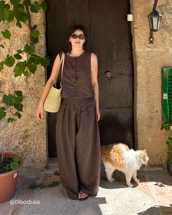 model wears bobbi chocolate linen trousers