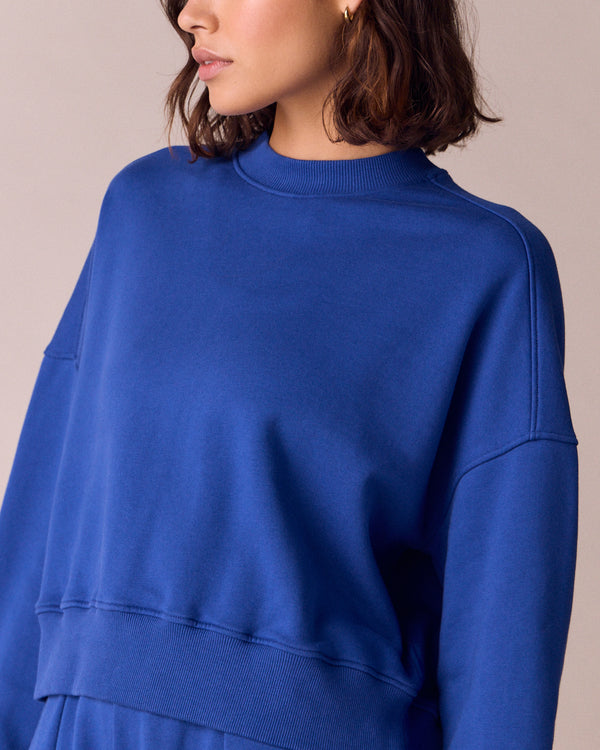 model wears eden cobalt jersey fleeceback jumper