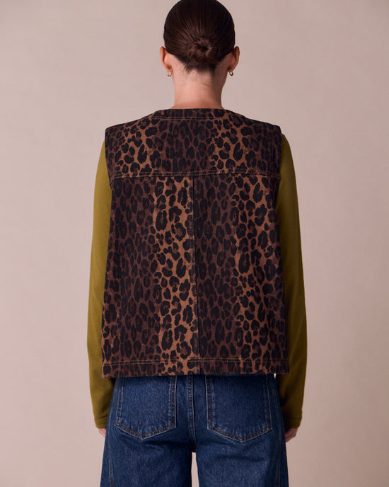 model wears kacie dark leopard denim gilet