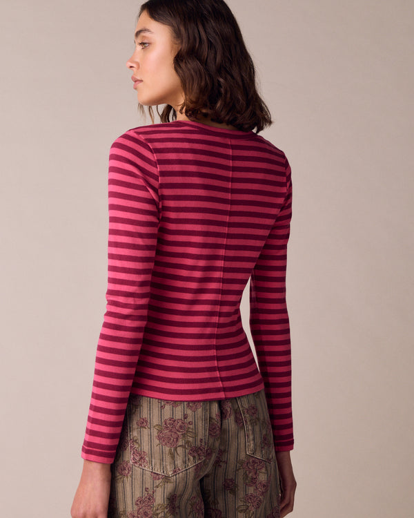 model wears lila raspberry and damson jersey top
