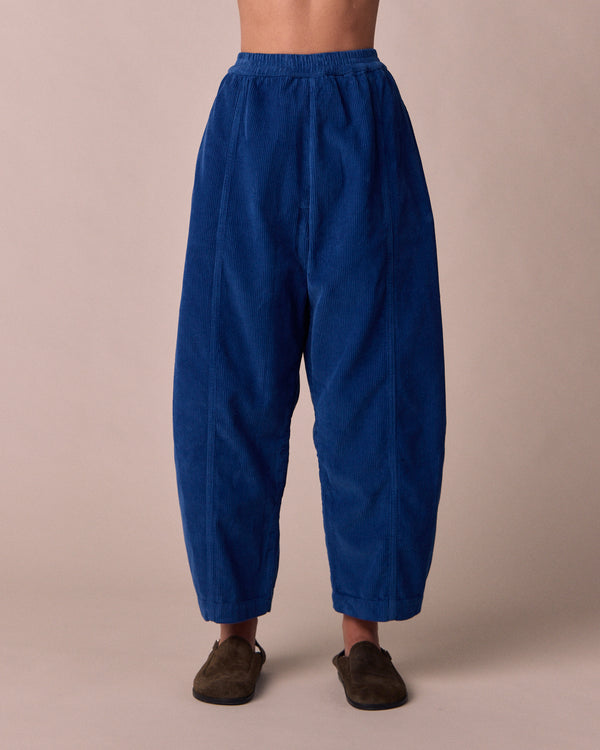 model wears mabel lapis blue cord trousers  front