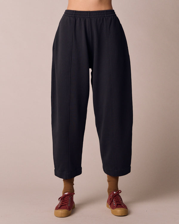 model wears mabel washed black fleeceback jersey trousers front