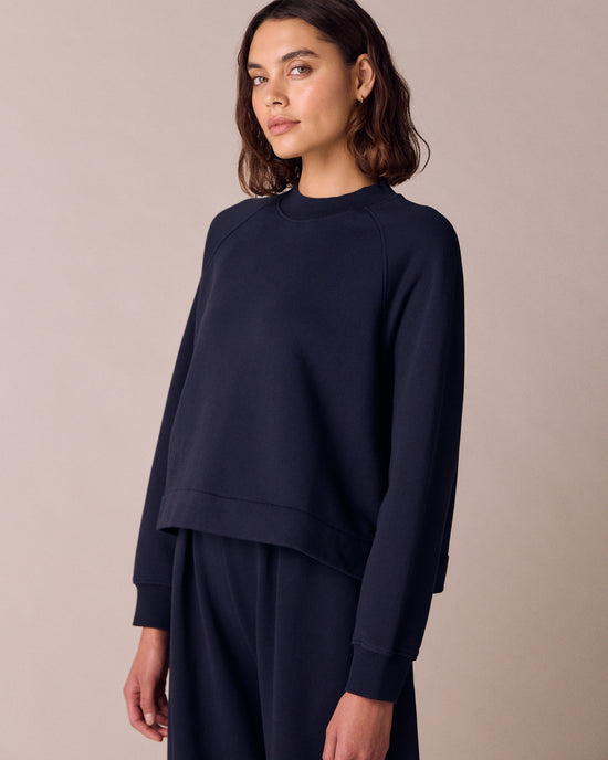 model wears noa ink jersey jumper