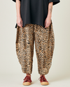 model wears leopard print cupro mabel trousers front