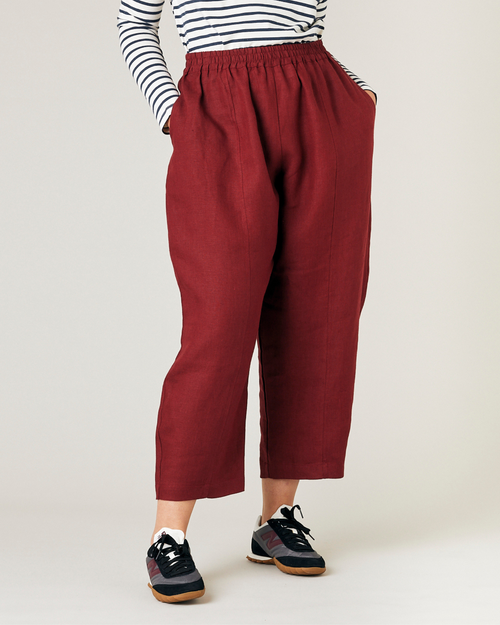 model wears brick linen mabel trousers