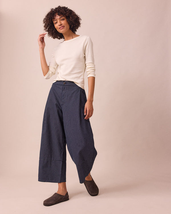 model wears blair navy pinstripe denim jeans