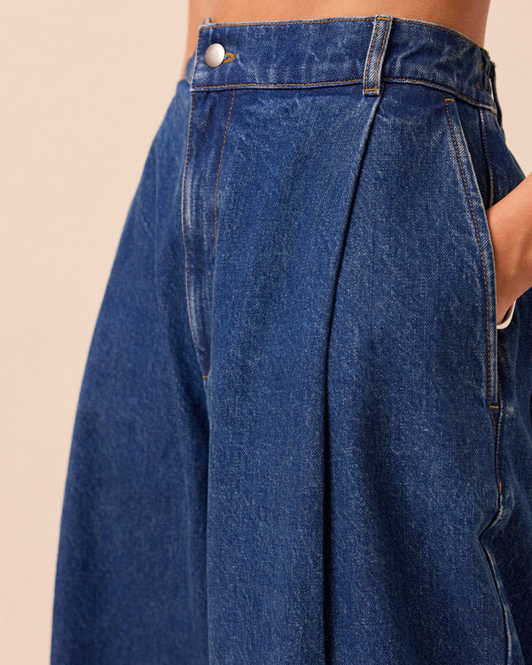 model wears blair mid wash denim jeans