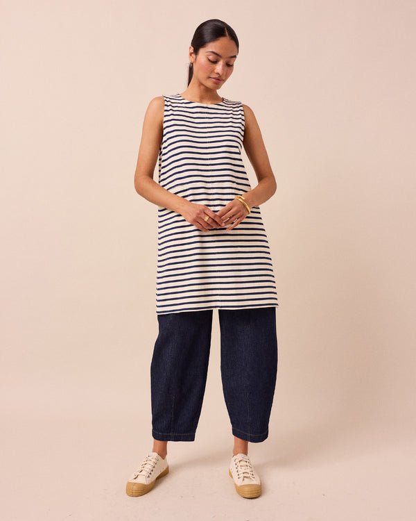 model wears a bree navy and ecru stripe tunic