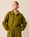 model wears cleo fresh olive jersey jumper