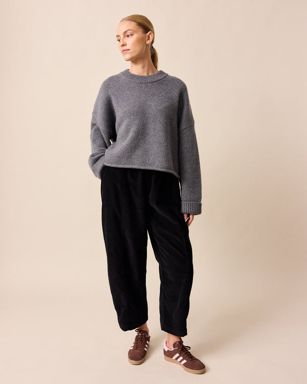 model wears coco charcoal knitted jumper