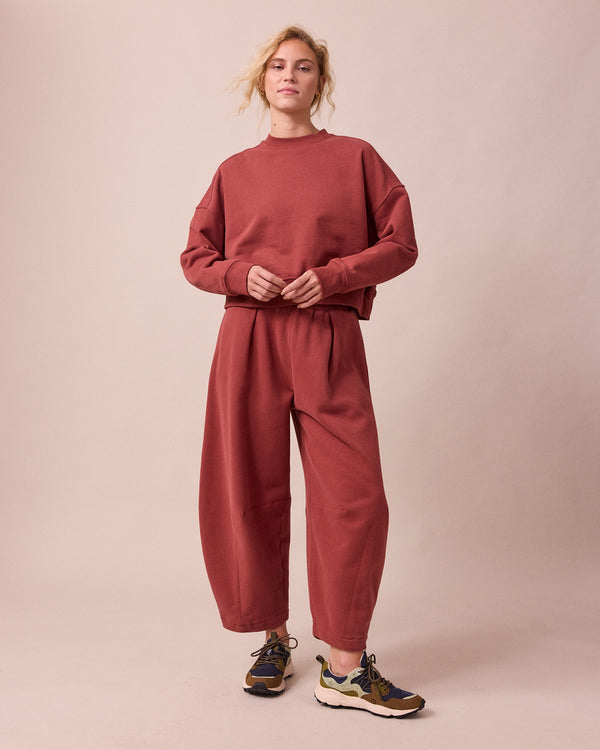 model wears eden brick fleeceback jersey jumper