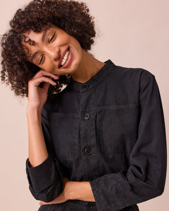 model wears jill black textured cotton jumpsuit