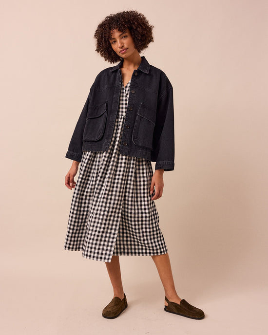 model wears kitty washed black denim jacket