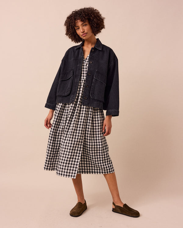 model wears kitty washed black denim jacket