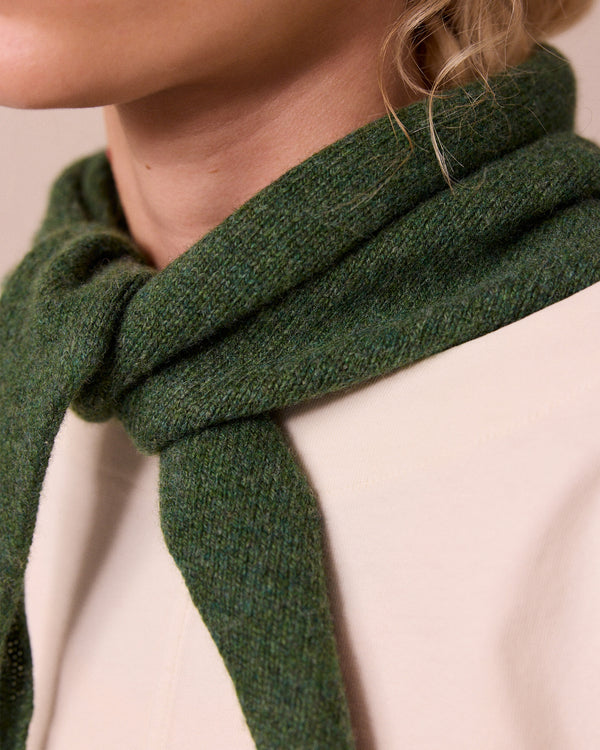 model wears knitted apple green neckerchief