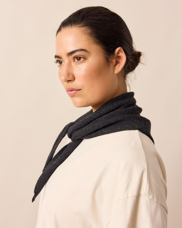 model wears charcoal knitted necerchief