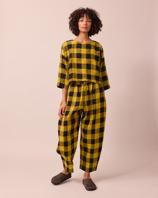 model wears lily chartreuse check linen top