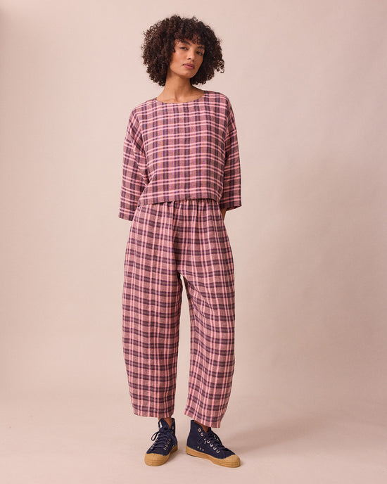 model wears lily dewberry check linen top