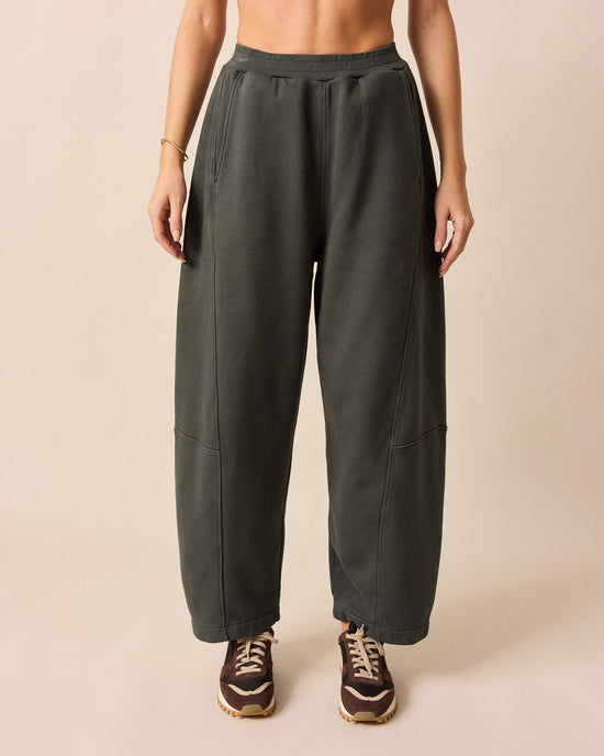 model wears lyra pumice fleeceback jersey trousers front